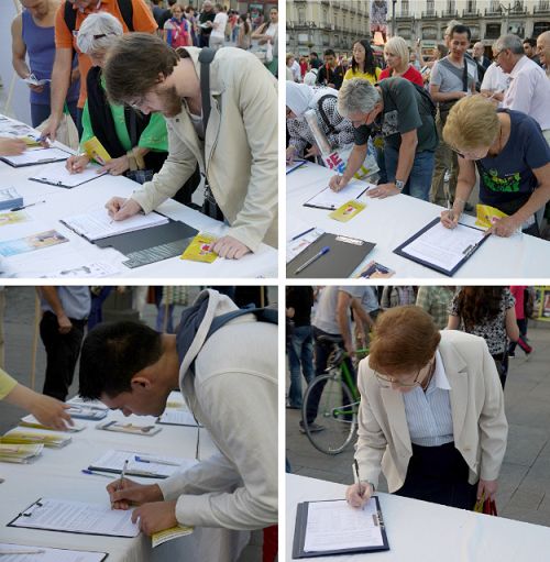各国民众在马德里市中心太阳广场上签名支持反迫害