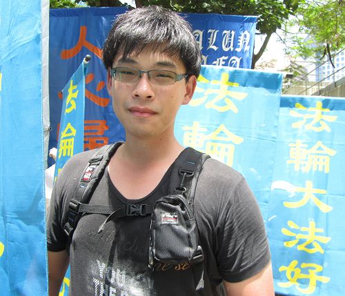 图12.台湾学员陈懿胜因为修炼法轮大法，人生有个美丽的转折。