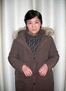 张育珍被关押9年后，于2009年11月9日被释放三个月后的照片